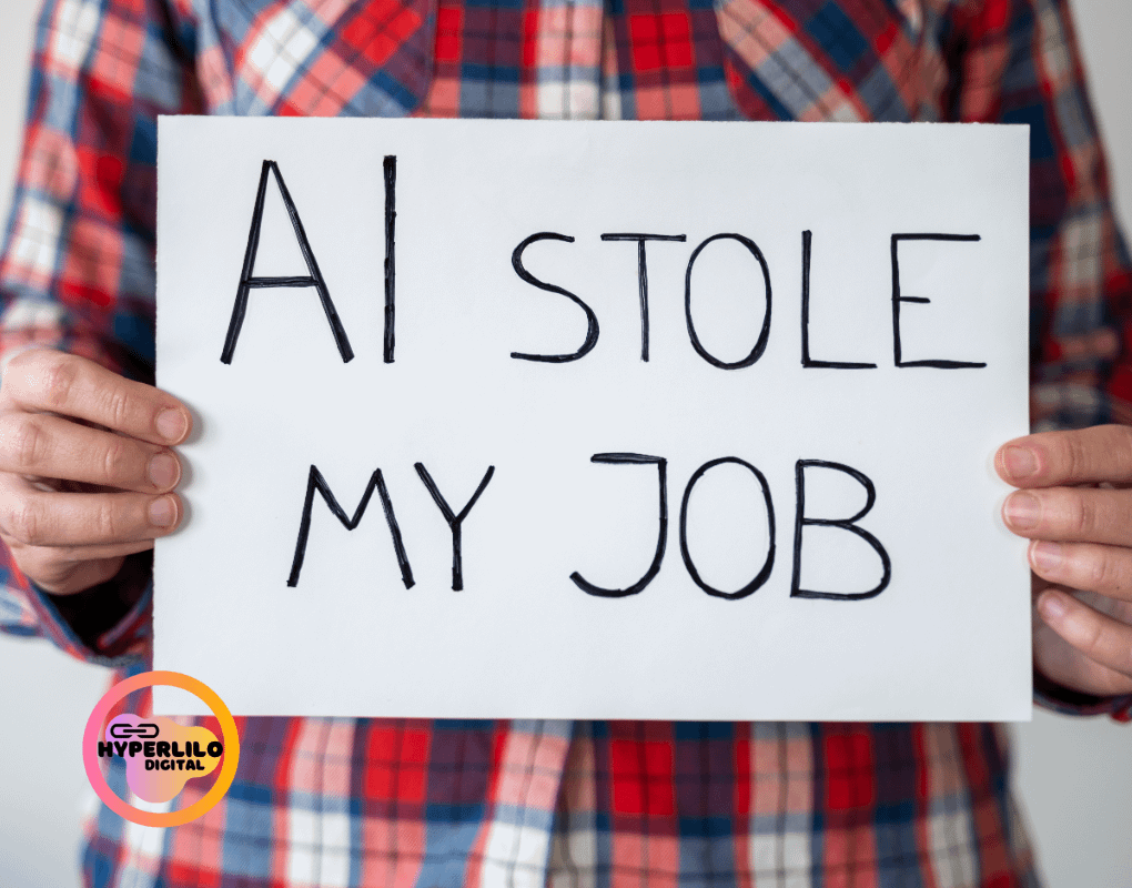 Person in plaid shirt holds a sign saying "AI STOLE MY JOB."