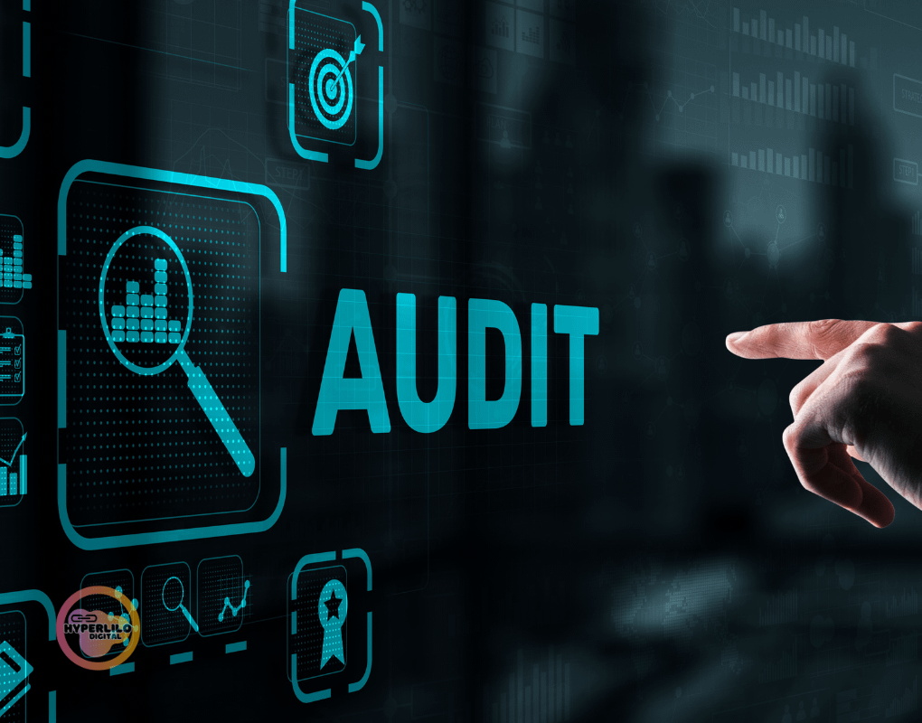 Modern screen with "AUDIT" word and a hand